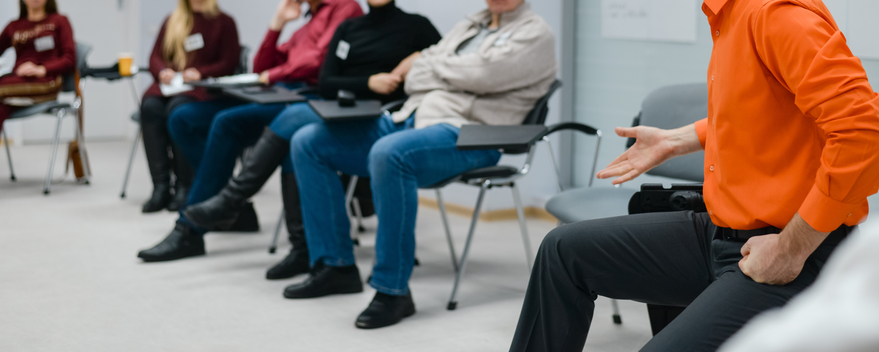 Image of man conducting a class